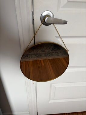 Amazon Gold Round Hanging Mirror with Amber-Tinted Glass